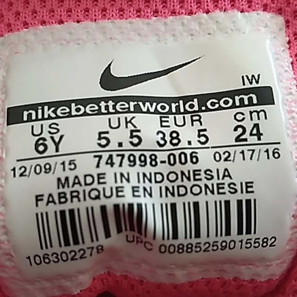 Youth Nike Team Hustle D7 pink and grey athletic shoes size 6 Youth. Excellent!!